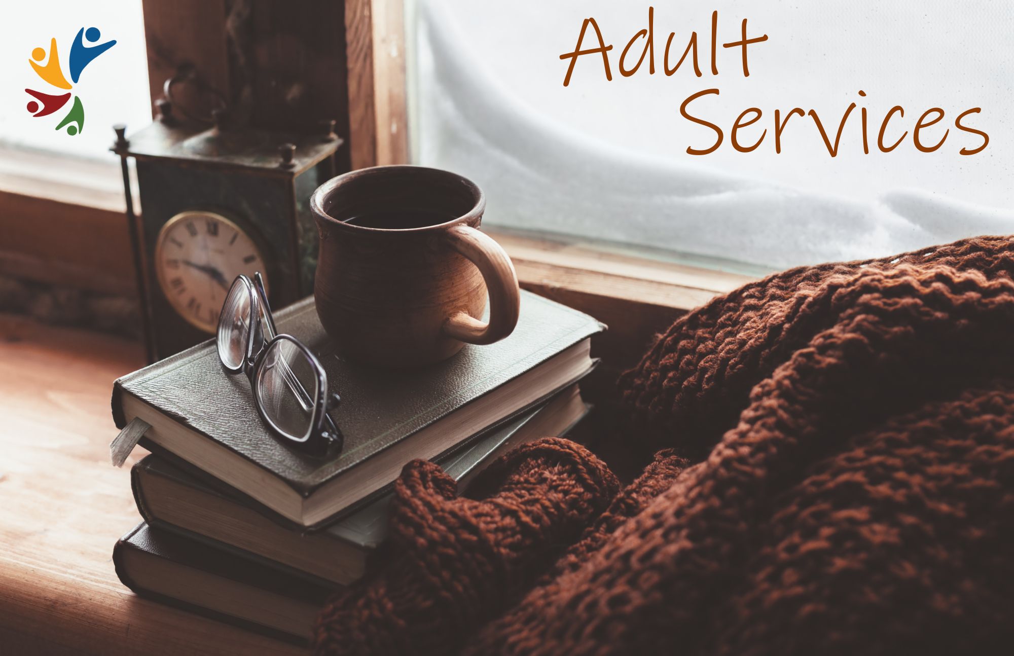 Stack of books with reading glasses on top, next to a mug and a cozy brown knitted blanket by a frosted window. An old-fashioned clock is partially visible in the background. Text on the image reads ‘Adult Services’ in brown, and the PPL logo appears in the top left corner.